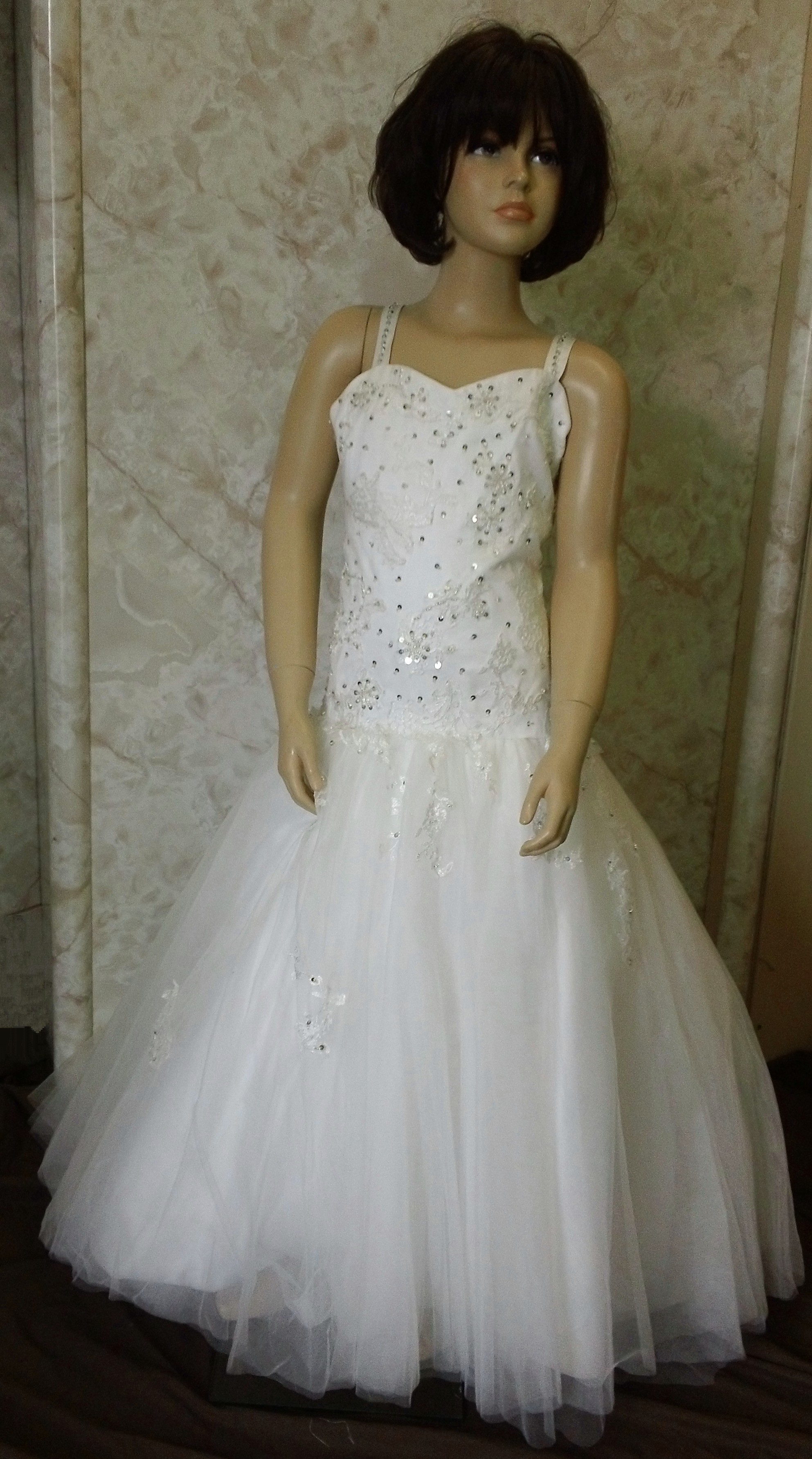 Miniature bride dresses.
